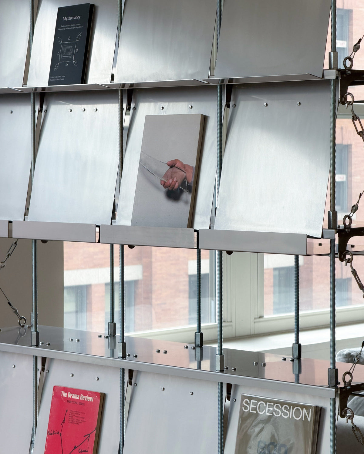 This bookshelf borrows its moving facade from architecture